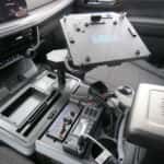 White 2025 Chevy Tahoe patrol vehicle parked outdoors with integrated push bumper and warning lights.