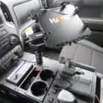 Chevrolet Silverado police department truck featuring LED flashers and lockable bed-mounted drawer system.