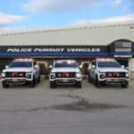 Front view of three white 2025 Chevrolet Tahoe emergency vehicles configured for Fire and EMS response.