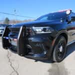 2026 Dodge Durango Police Pursuit Vehicle front profile with law enforcement lighting