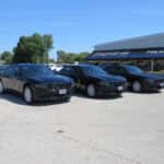 Front three-quarter view of three Dodge Chargers upfitted for School Resource Officers