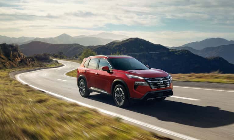2025 Nissan Rogue driving on a highway