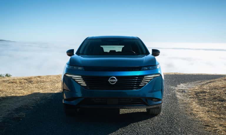 2025 Nissan Murano facing head-on atop mountain