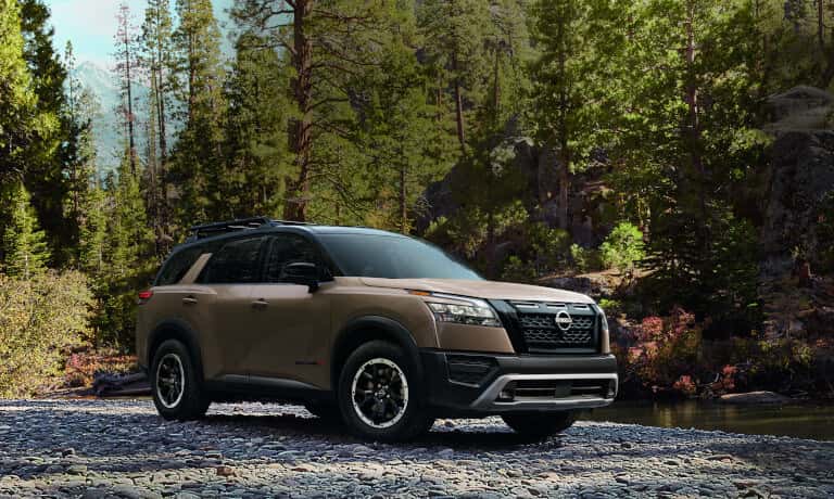 2025 Nissan Pathfinder parked in a stream