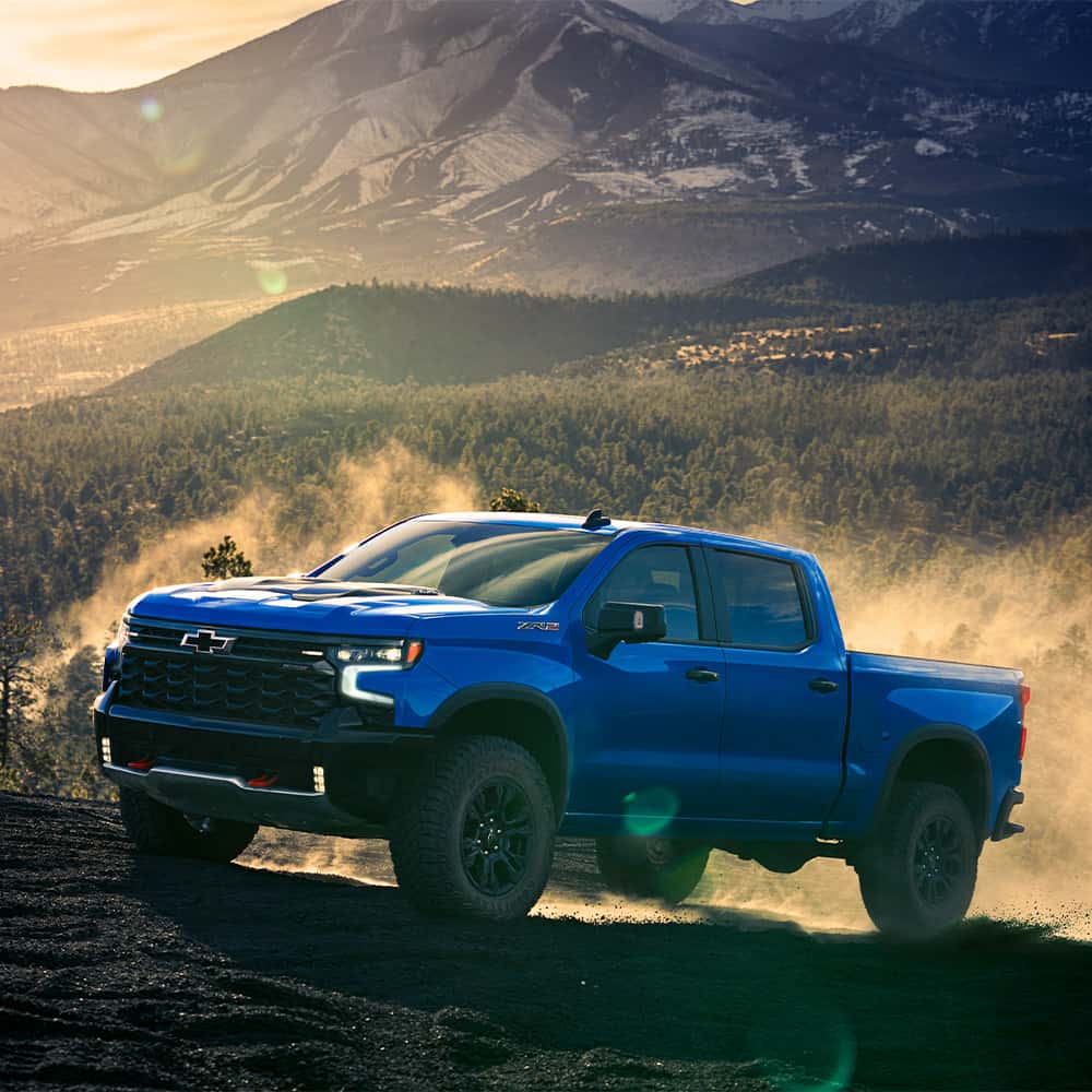 2025 Chevrolet Silverado ZR2 off-road trim with 33-inch mud-terrain tires, Multimatic DSSV dampers, and skid plates