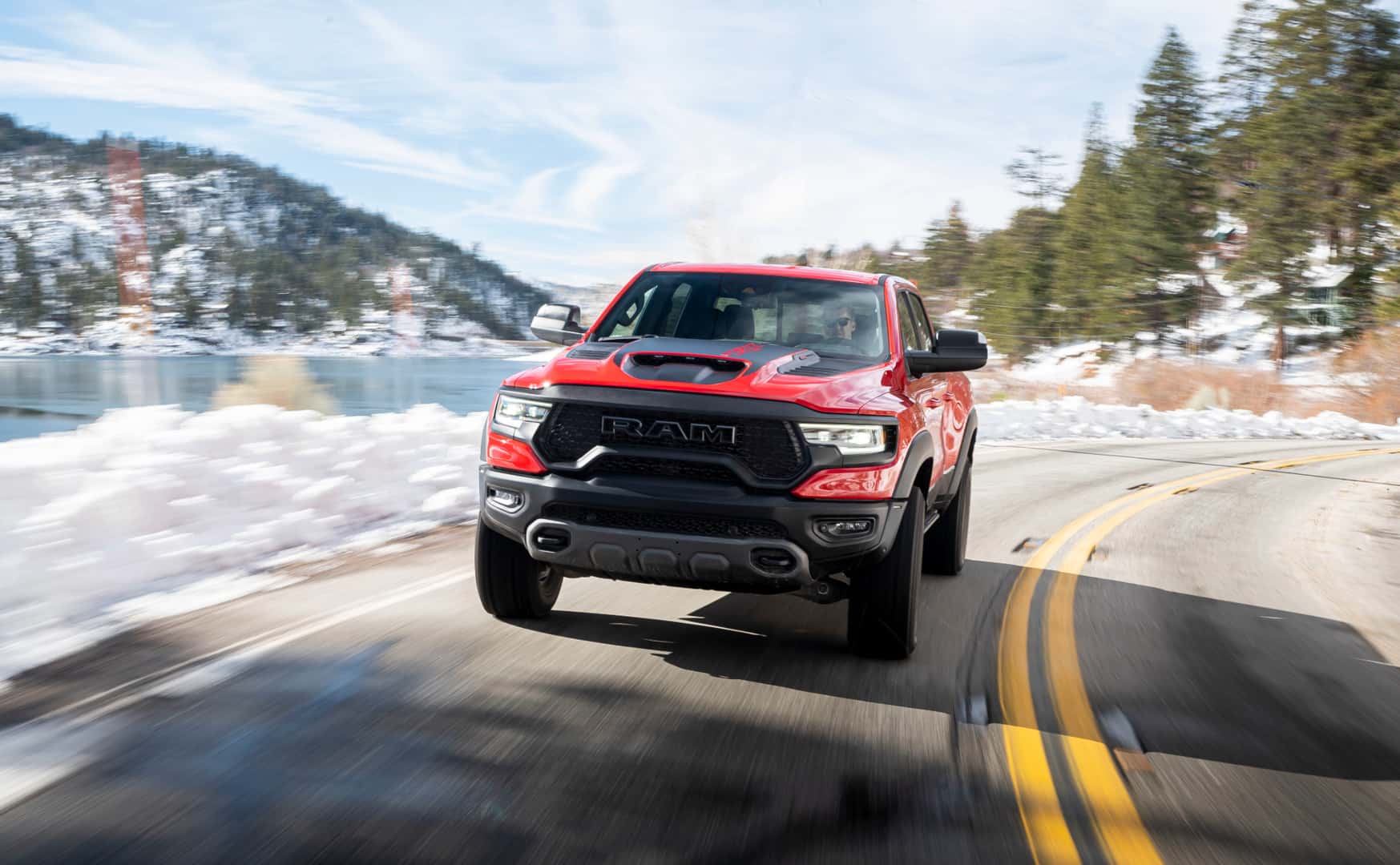 Ram 1500 trucks near Juneau, AK driving in winter.