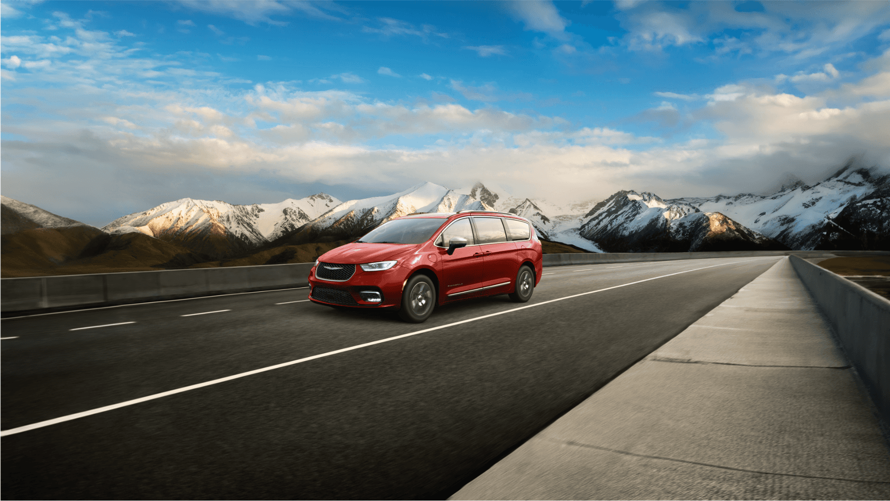 Family loading into a Chrysler Pacifica in Juneau