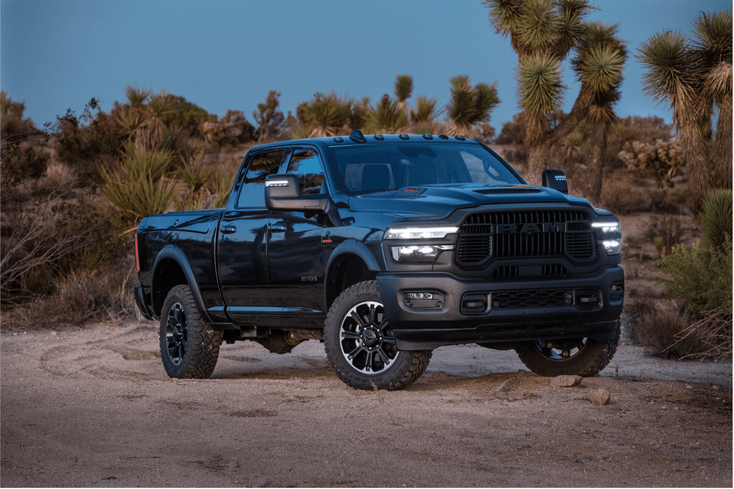 Ram 2500 Power Wagon Rebel parked with headlights on