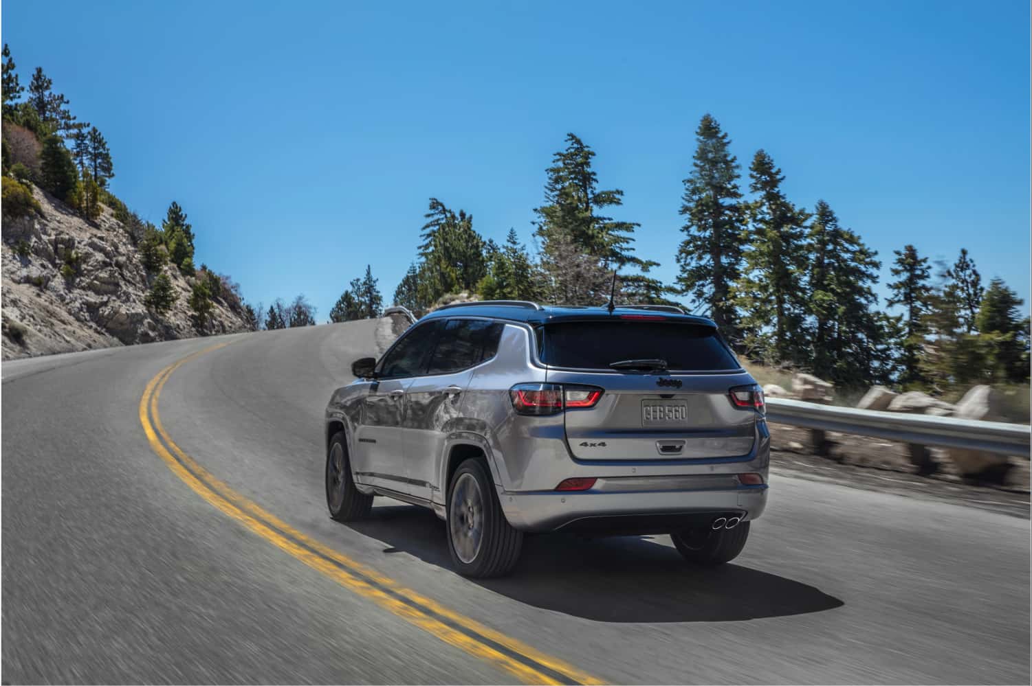 Jeep Compass 4x4 mountain road driving image representing Haines Highway-style conditions