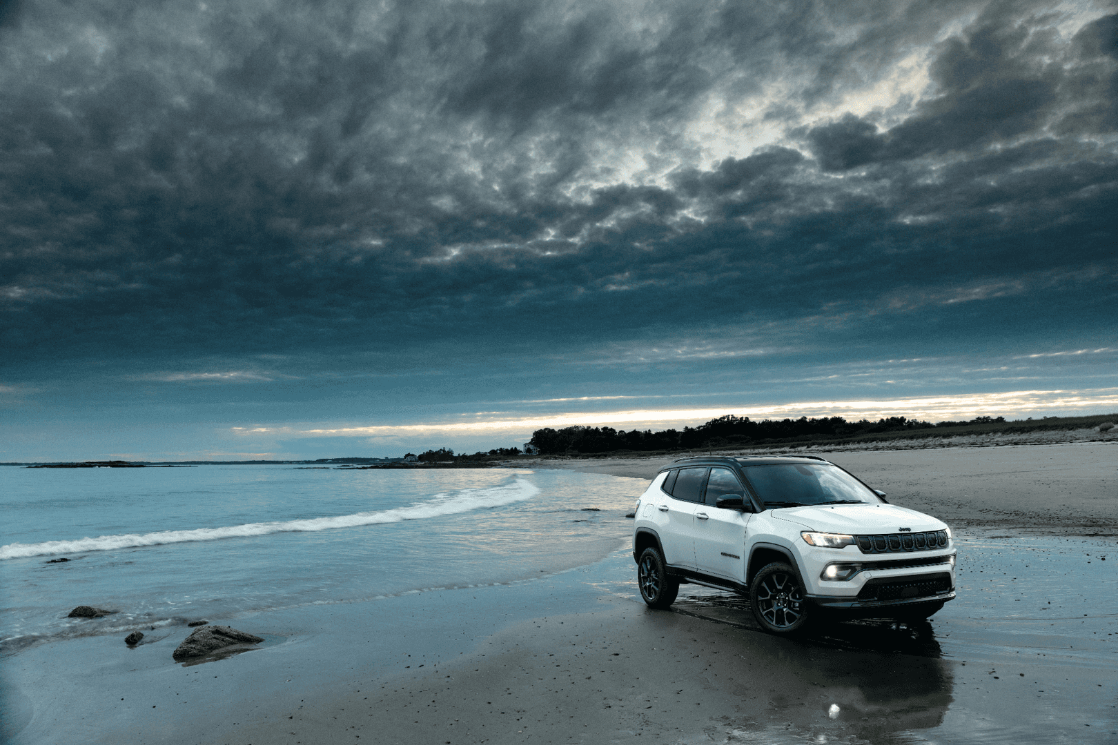Jeep Compass coastal driving image representing wet coastal conditions near Haines Alaska