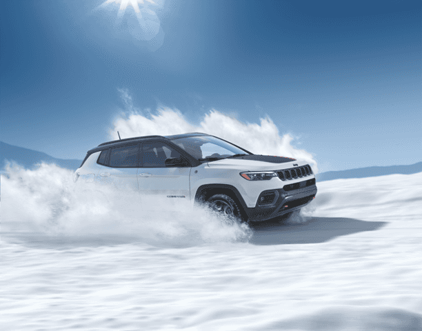 Jeep Compass driving in winter conditions in Juneau Alaska