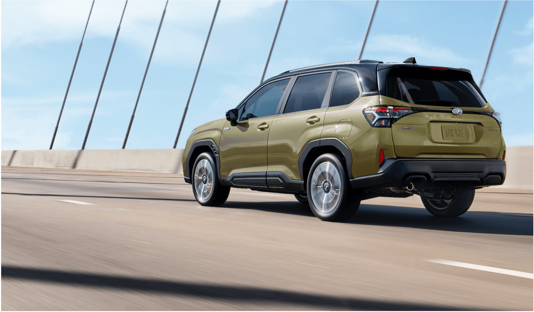2025 Subaru Forester Hybrid on a bridge in Southeast Alaska