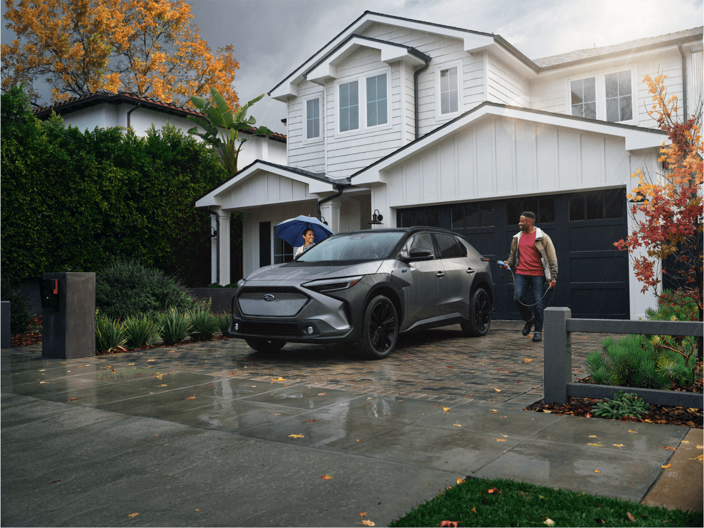 Solterra charging at a home under cover — Gustavus weather ready
