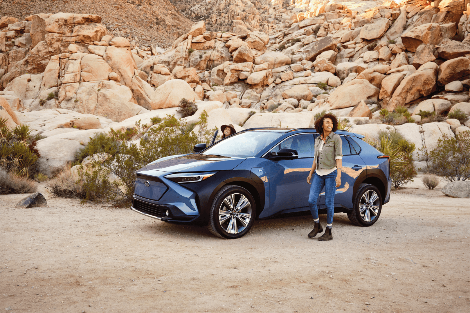 Subaru Solterra EV with adventurers - All-Electric AWD SUV