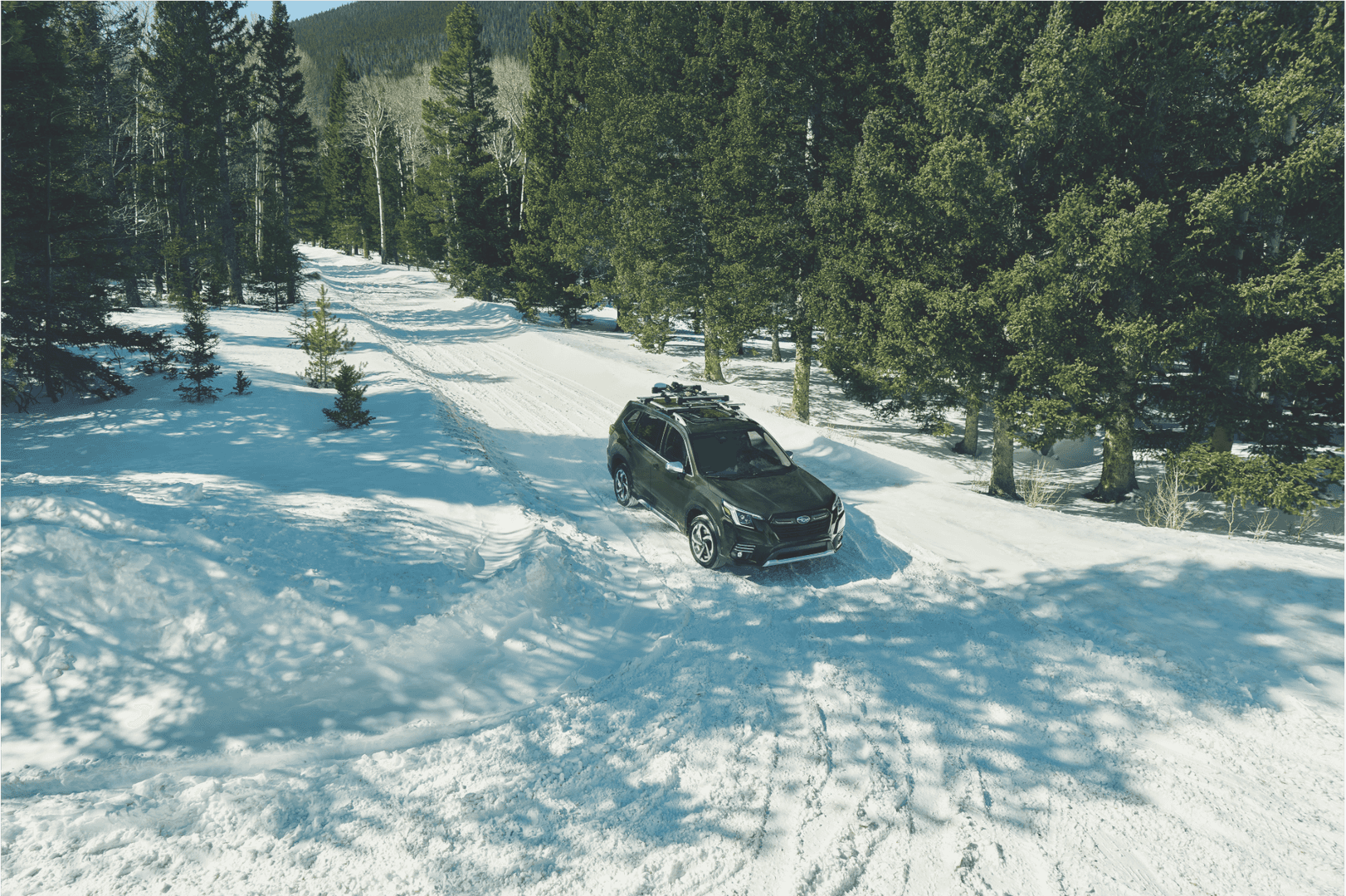 Subaru Forester ready for winter driving on snow covered road