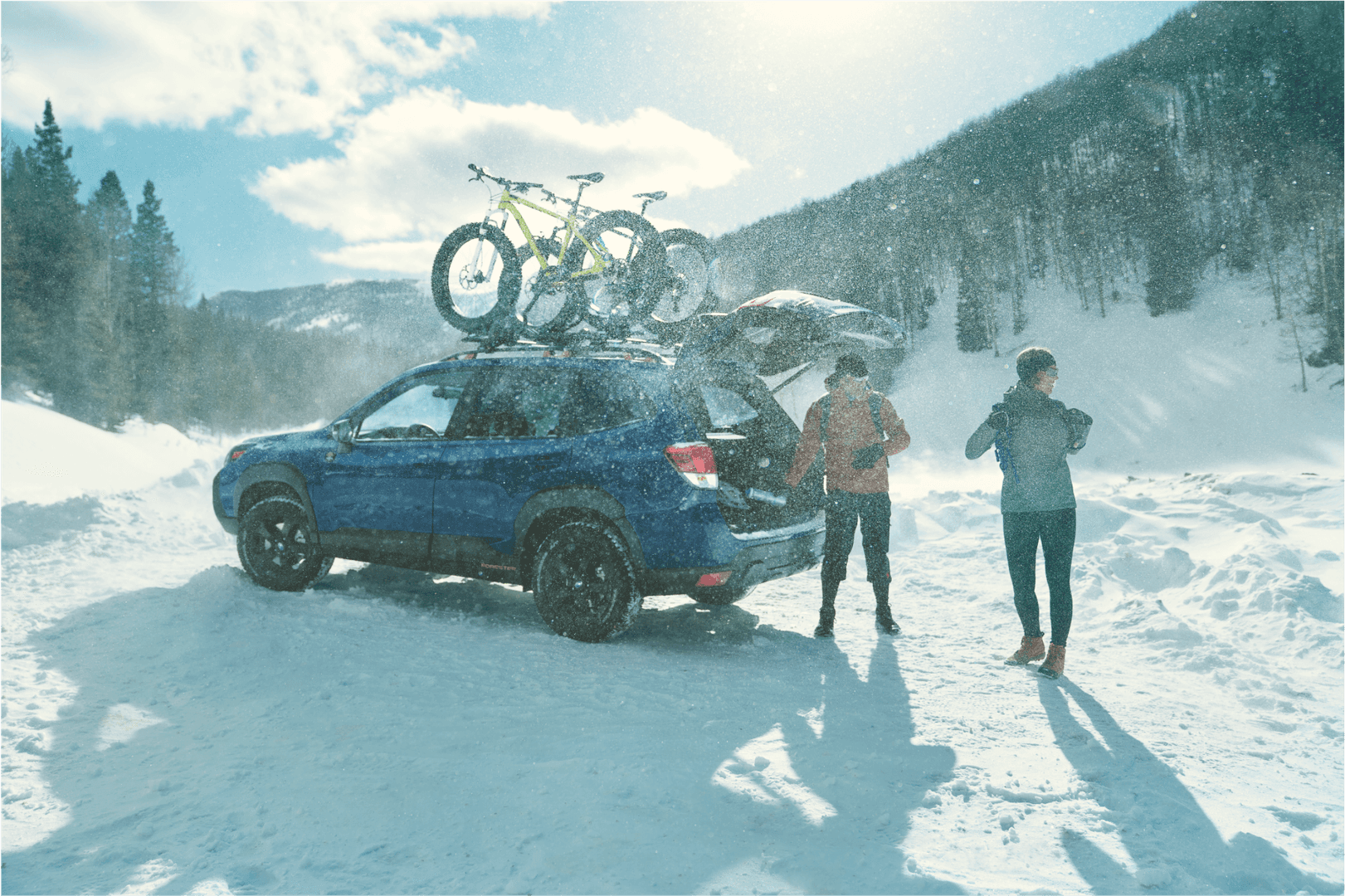 Subaru Forester Wilderness in snowy Alaska mountains with bikes and adventure gear