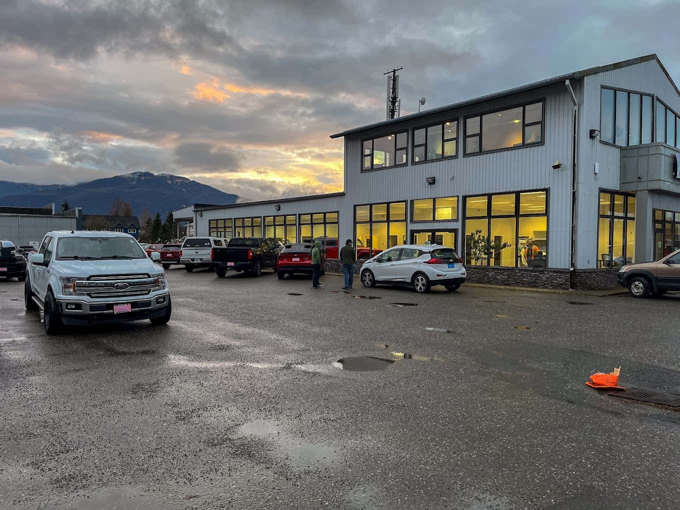 Auto Mall area in Juneau with surrounding mountains and trees