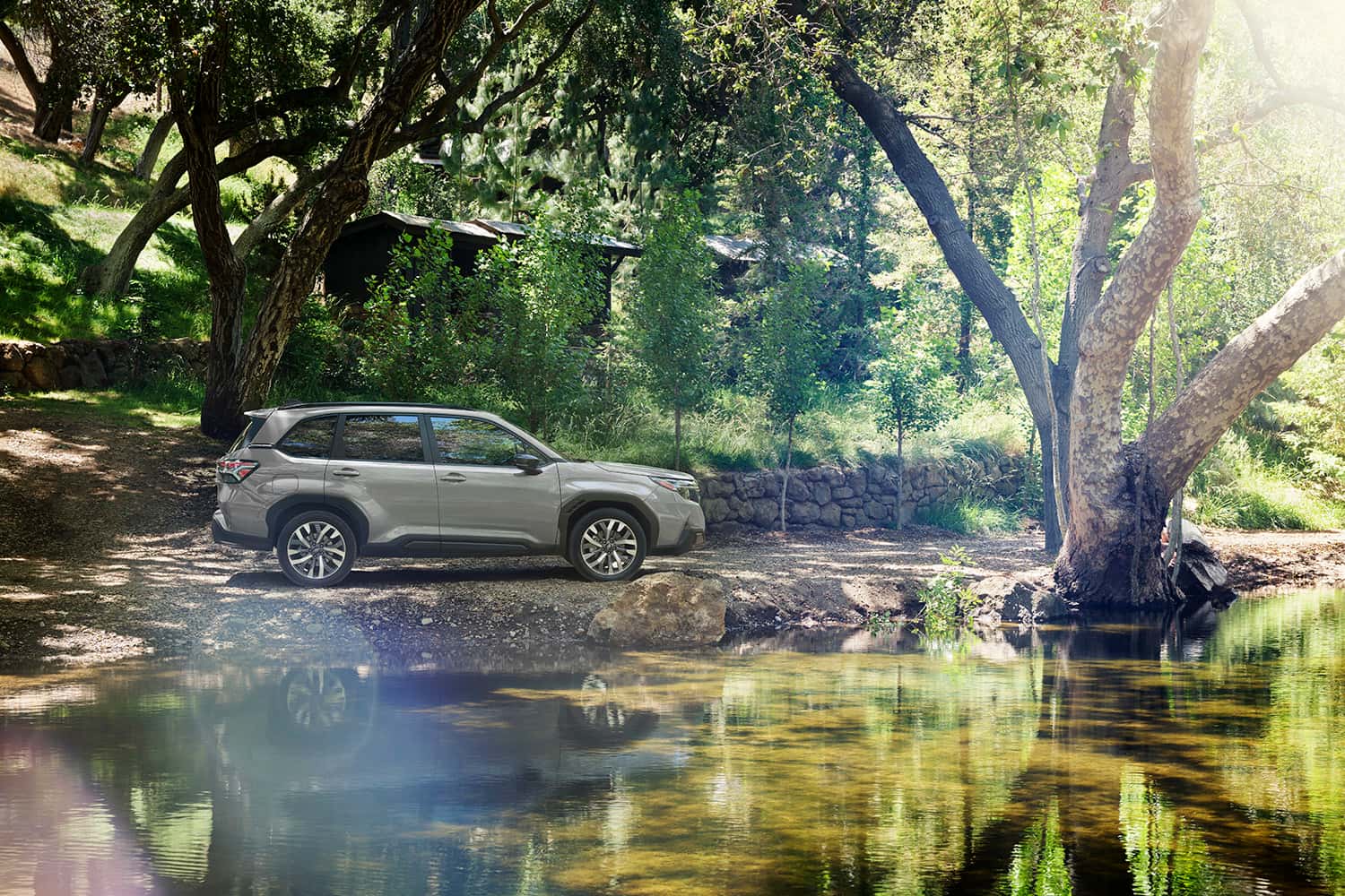 Subaru Forester parked at a creekside camp spot like you find near Gustavus and Bartlett Cove