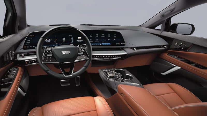 Inside showing dashboard 2026 Cadillac OPTIQ Premium Luxury SUV 1SE