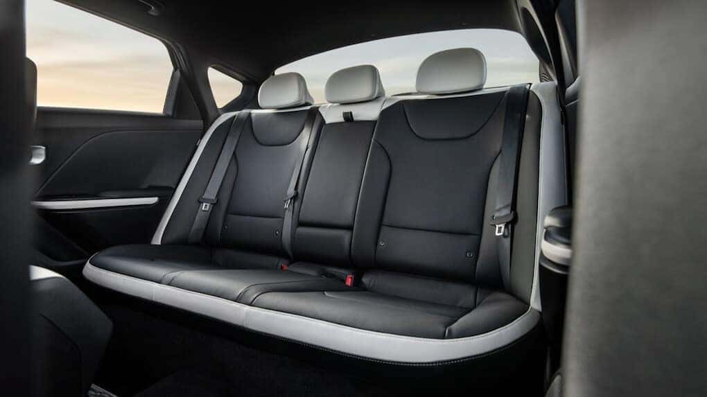 2025 Kia K4 rear seats featuring premium black-and-white upholstery and ample space