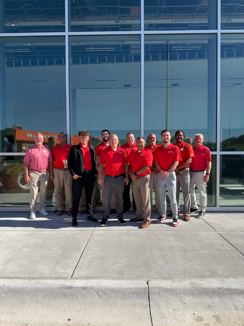 Kia of Lincoln team outside the new dealership in Lincoln, Nebraska