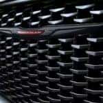 A close up shows the black grille on a 2023 Chrysler 300S.
