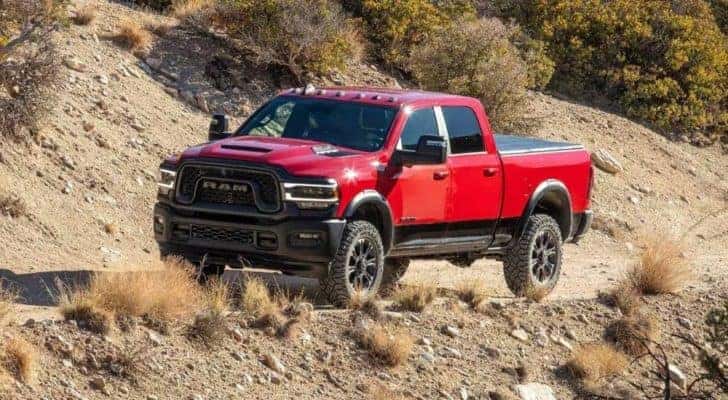 A red 2024 Ram 2500 for sale is shown from the front at an angle.
