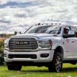 A white 2024 Ram 2500 is shown on a cloudy day after looking at Ram trucks for sale near Charlotte.