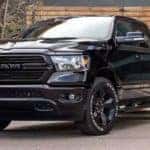 A black 2024 Ram 1500 is shown parked after viewing Ram trucks for sale.