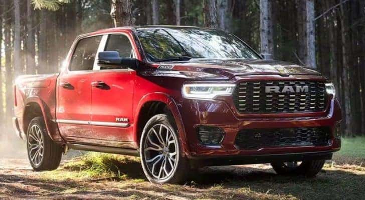 A red 2025 Ram 1500 Tungsten is shown from the front at an angle after leaving a dealer that has Ram Trucks for Sale Near Statesville.