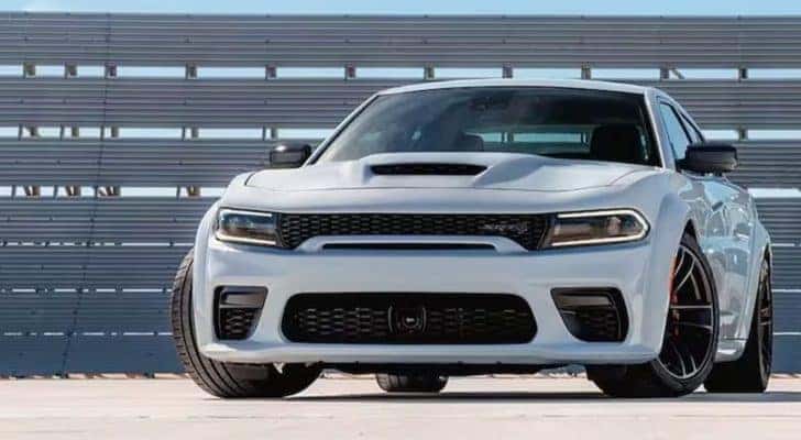 A white 2023 Dodge Charger SRT Hellcat Redeye Jailbreak is shown parked after viewing Dodge Charger sales.