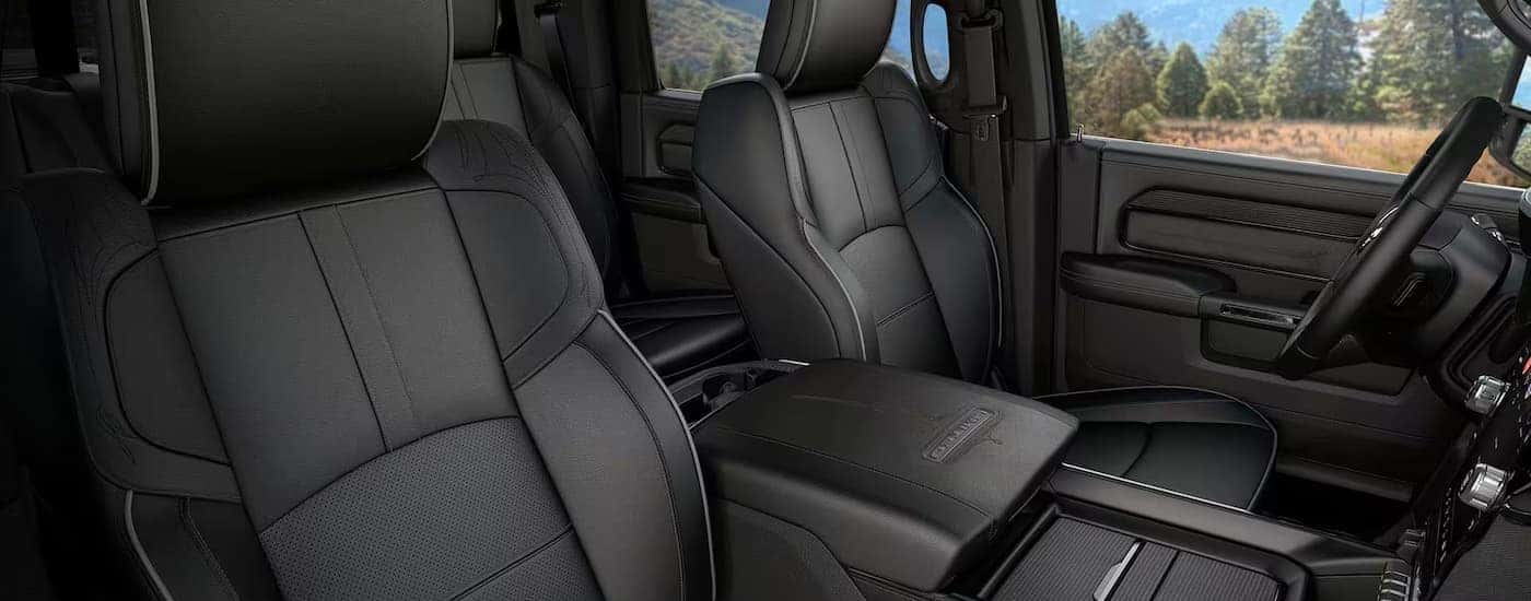 The black interior is shown in a 2024 Ram 3500 Limited.