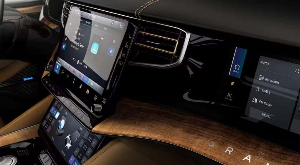 Close-up of the infotainment screens in a 2025 Jeep Grand Wagoneer for sale.