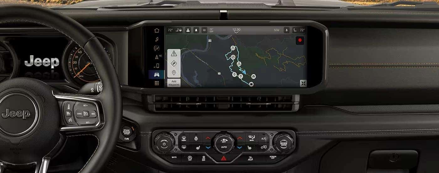 Close-up of the black dash in a 2025 Jeep Wrangler for sale near Davidson.