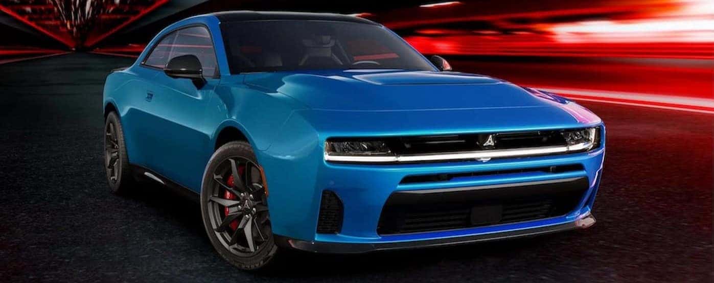 A blue 2025 Dodge Charger SIXPACK parked in a tunnel.