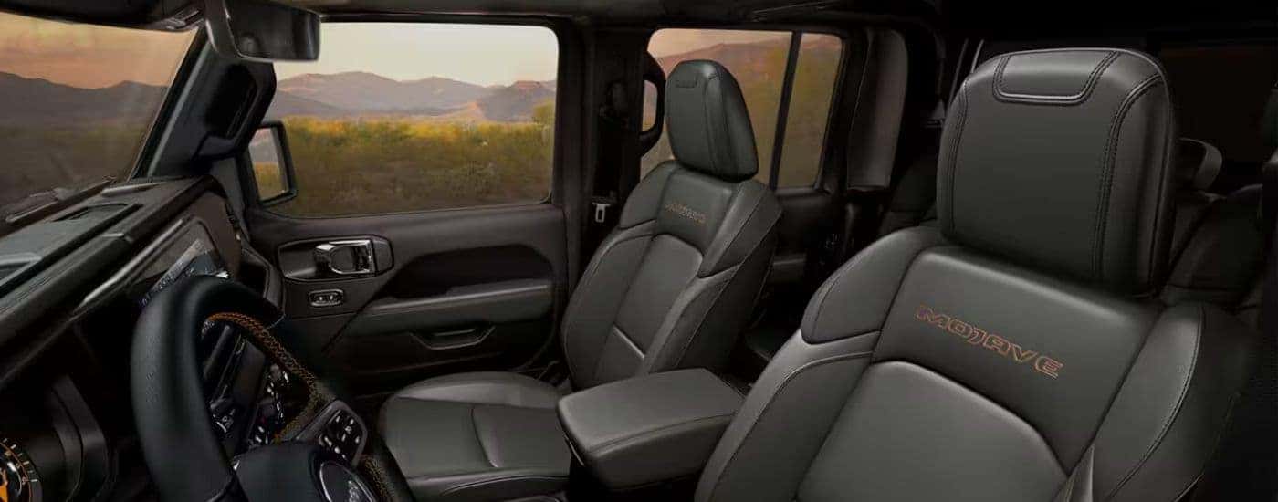 The black interior of a 2025 Jeep Gladiator Mojave for sale near Statesville.