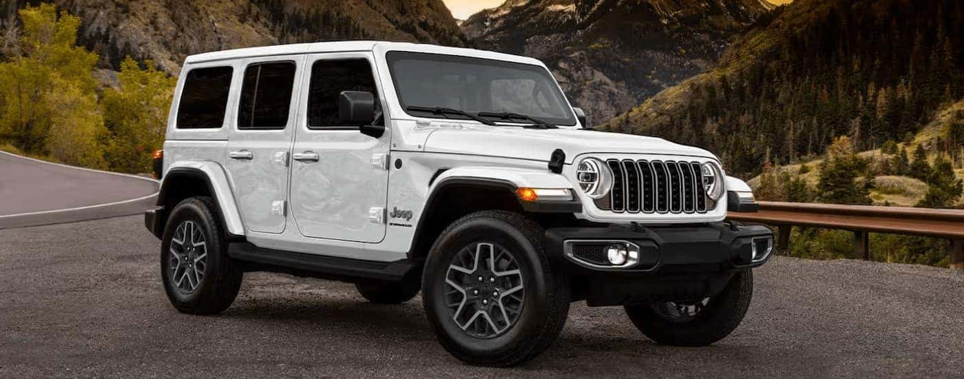 Parked white 2025 Jeep Wrangler Sport for sale near Statesville.