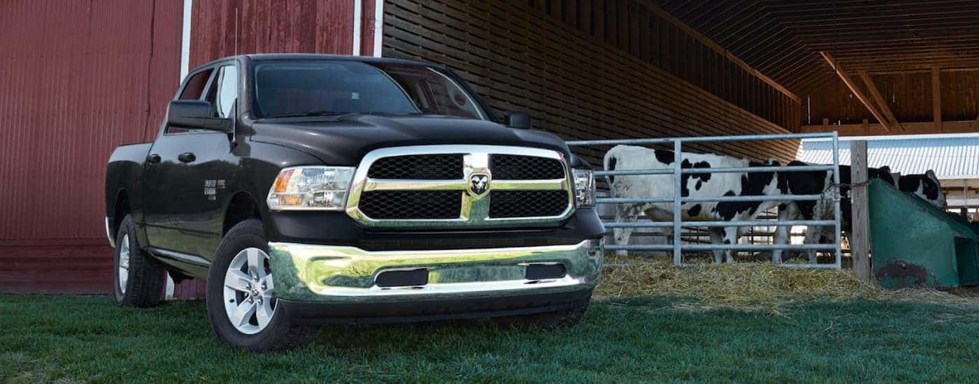 A black 2019 Ram 1500 Classic from the front after leaving a dealer that has a used Ram for sale near Huntersville.