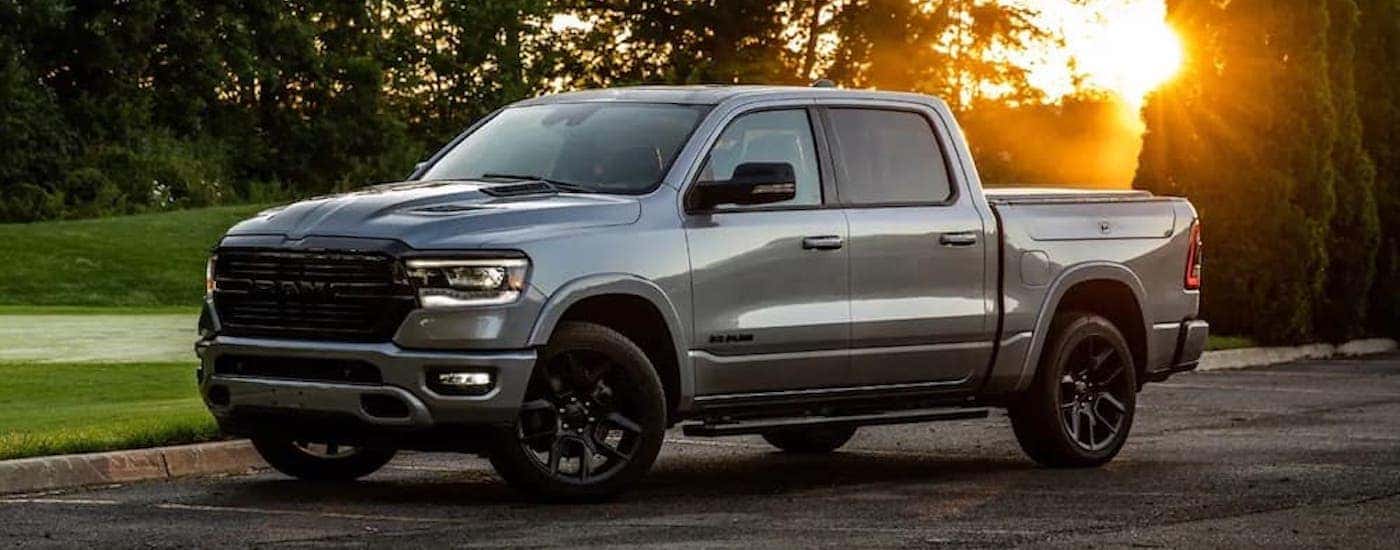 A grey 2022 Ram 1500 from the side.