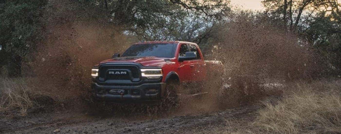 A red 2022 Ram 2500 Power Wagon after leaving a dealer that has a used Ram for sale near Concord.