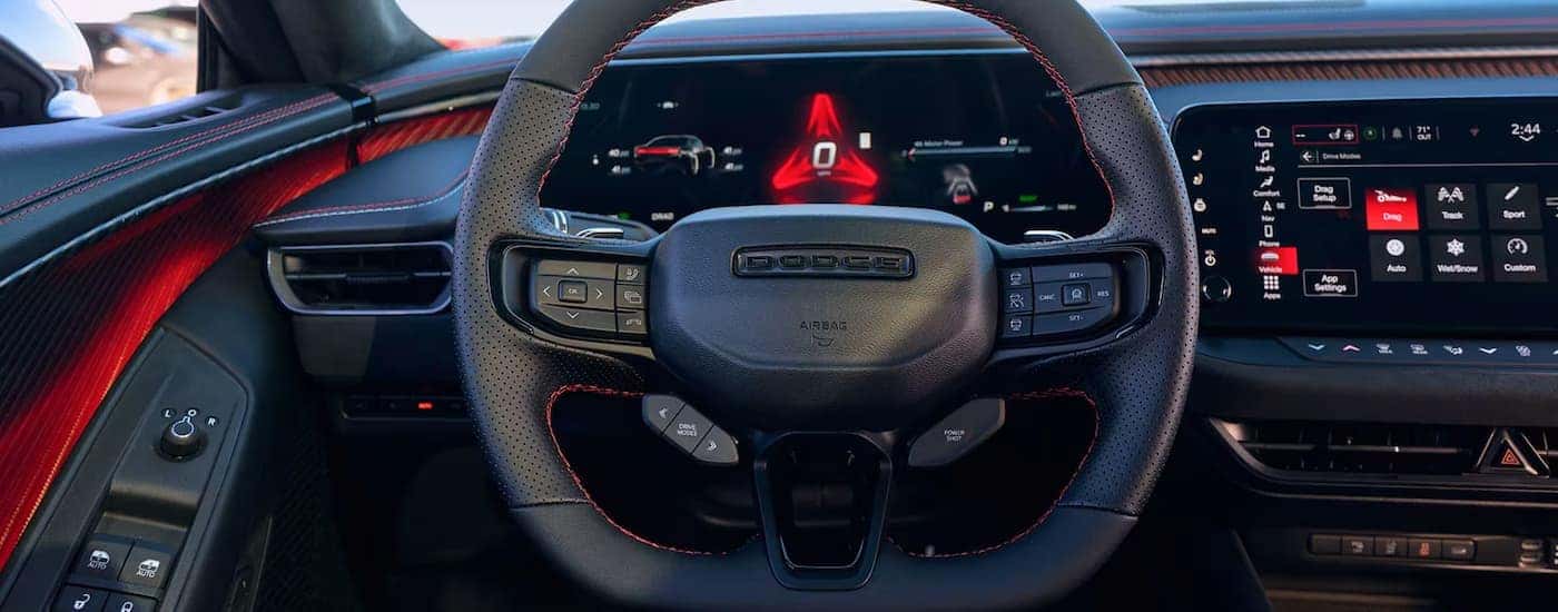 Steering wheel and digital gauge cluster on a 2025 Dodge Charger for sale near Davidson