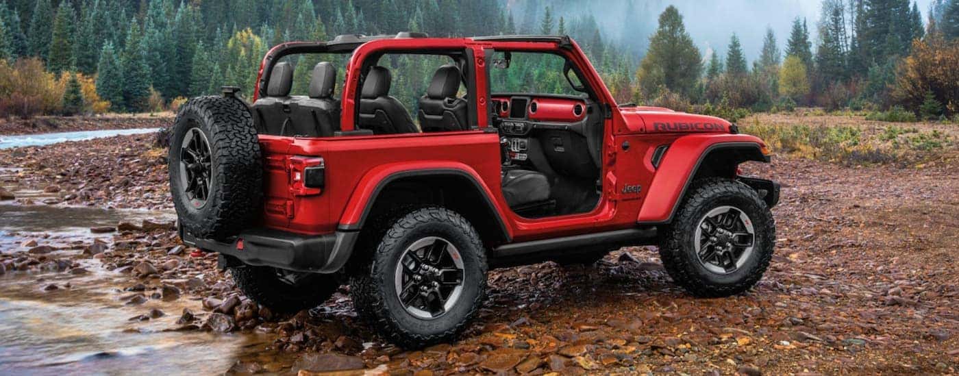 Red 2020 Jeep Wrangler parked off-road