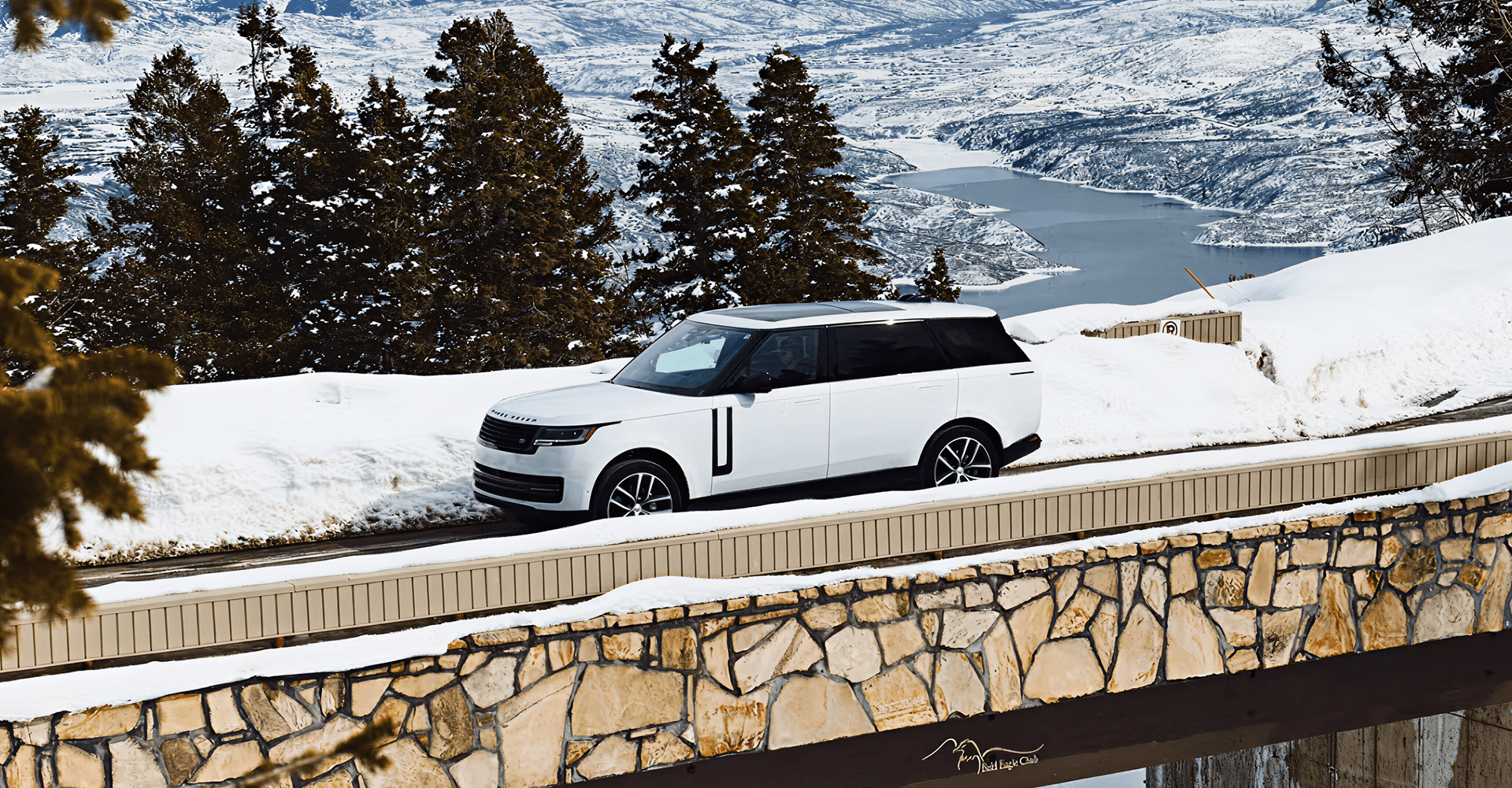Range Rover in snowy mountain landscape
