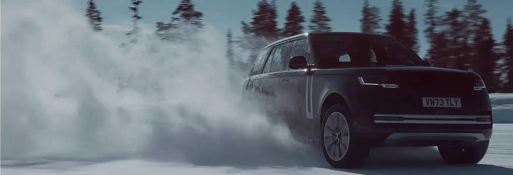 Range Rover Electric driving through snow