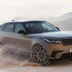 2025 Land Rover Range Rover Velar driving through sandy terrain