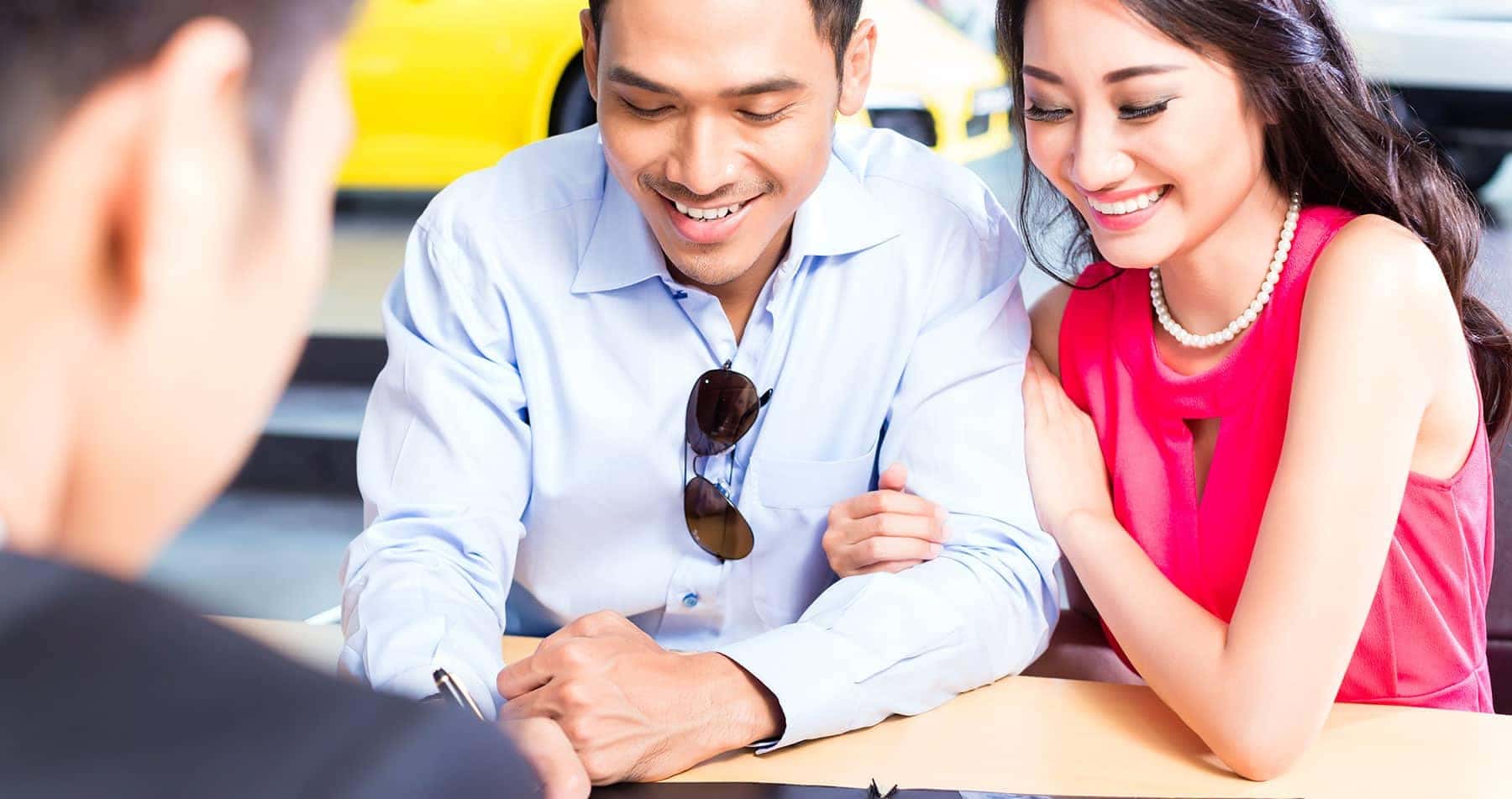 Couple reviewing finance documents