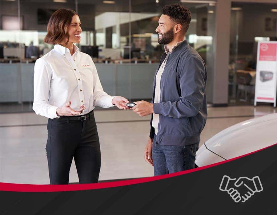 Man and Woman Passing off Keys