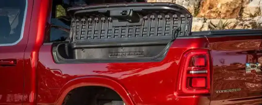 Open RamBox cargo storage bin on the 2027 Ram 1500 bed rail