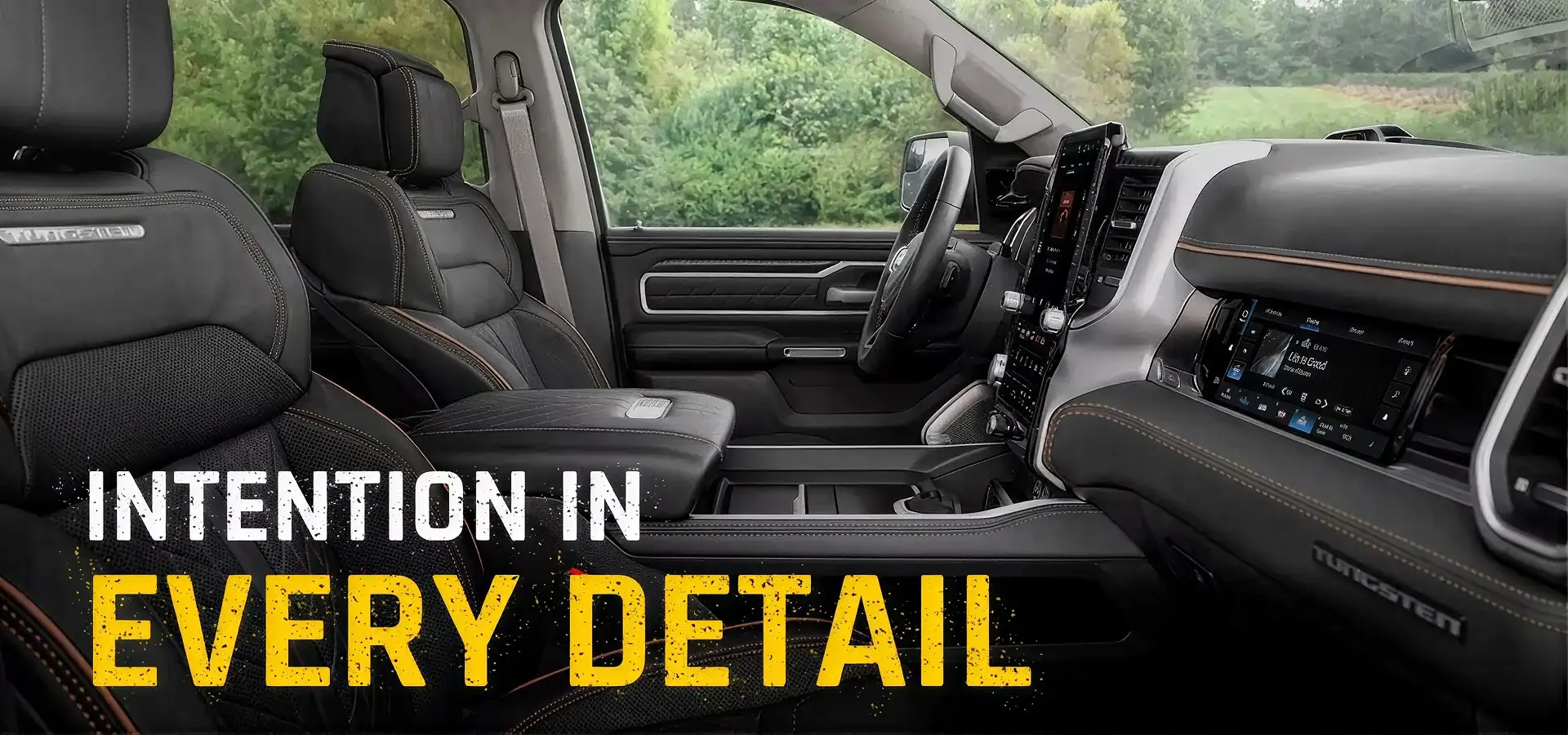 Intention in every detail - Tungsten interior of the 2027 Ram 1500 with quilted seats and a vertical touchscreen