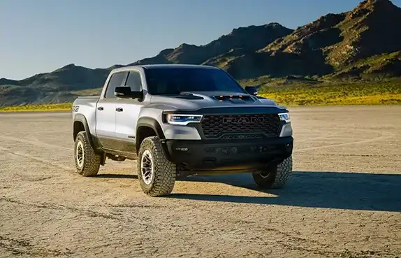 White 2027 Ram 1500 parked on desert flats